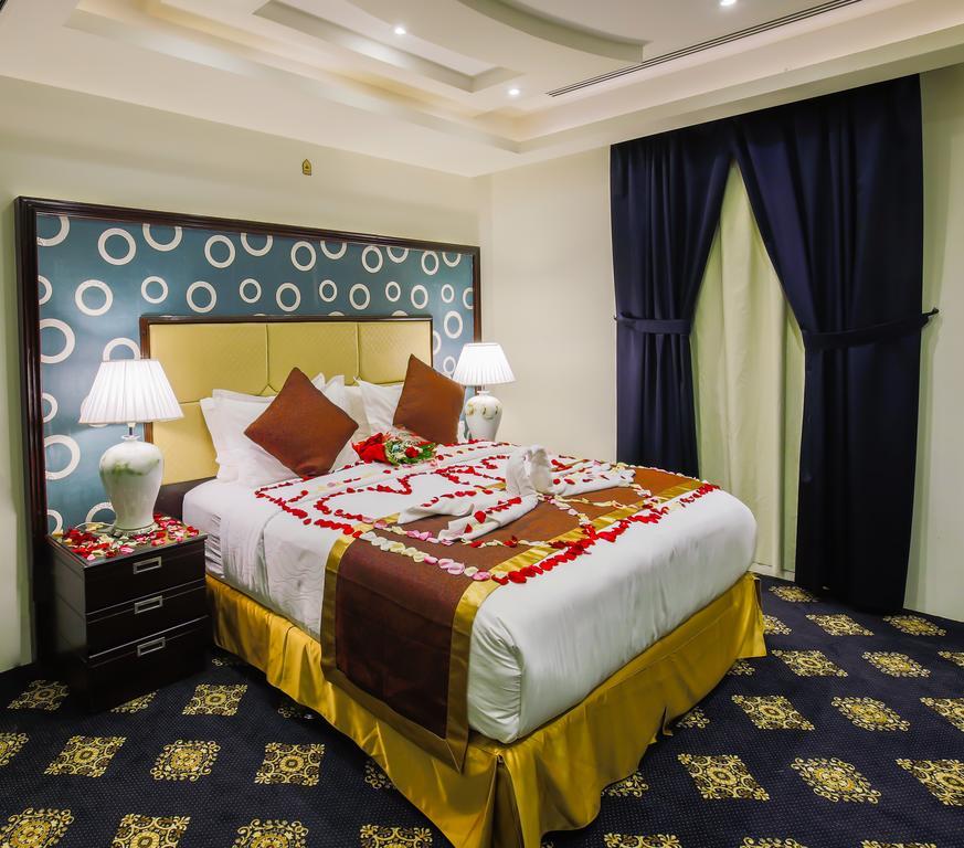 Rest Night Hotel Apartment Riadh Exterior foto A bedroom in a hotel