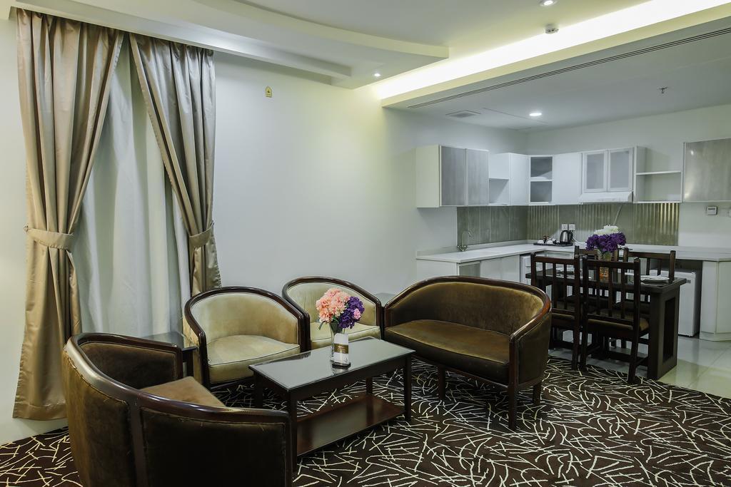 Rest Night Hotel Apartment Riadh Exterior foto A living room in a typical apartment