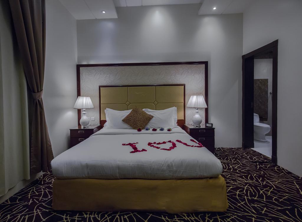 Rest Night Hotel Apartment Riadh Exterior foto A bedroom in the hotel