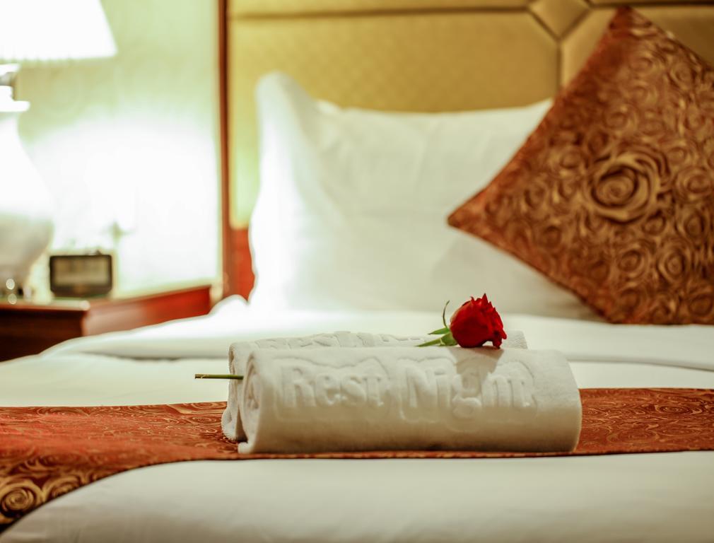Rest Night Hotel Apartment Riadh Exterior foto A rolled towel on a bed