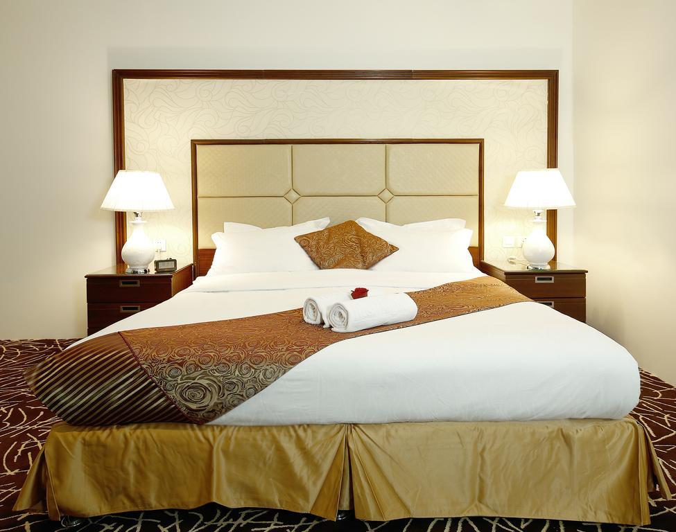 Rest Night Hotel Apartment Riadh Exterior foto A bed