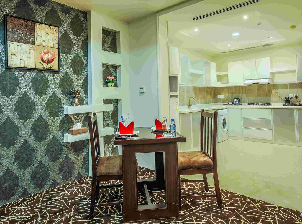 Rest Night Hotel Apartment Riadh Exterior foto A kitchen in a hotel suite