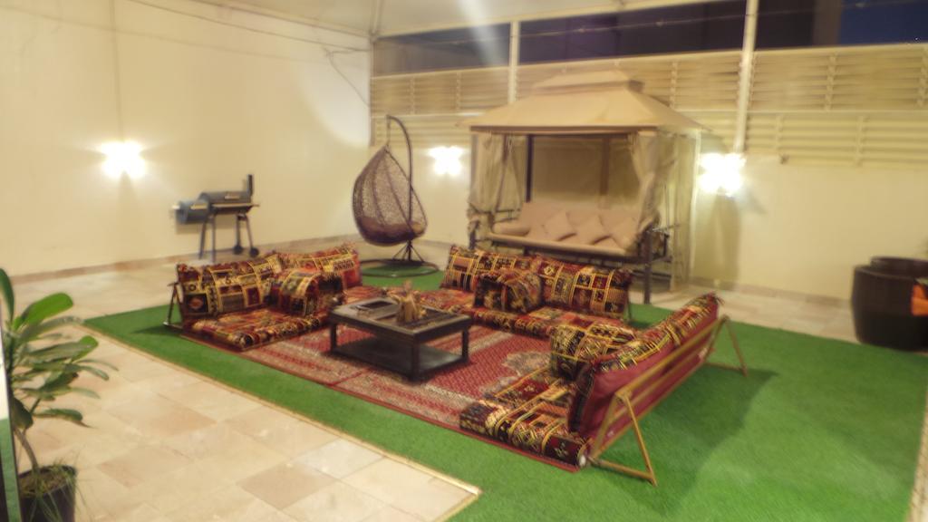 Rest Night Hotel Apartment Riadh Exterior foto A majlis in a hotel in Dubai